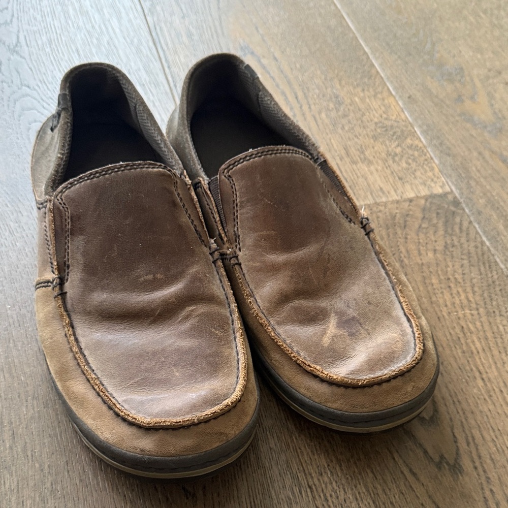 Men’s dark brown slip on shoes.